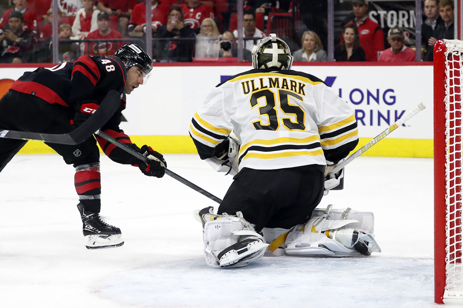 Boston Bruins goaltender Linus Ullmark misses the winning shot off