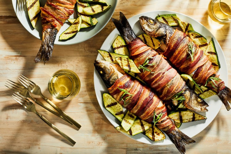 Grilled Bacon-Wrapped Trout. MUST CREDIT: Photo by Justin Tsucalas for The Washington Post.