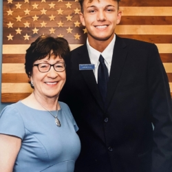 Senator Susan Collins poses with her summer page nominee Landon Cougle of Auburn.jpg