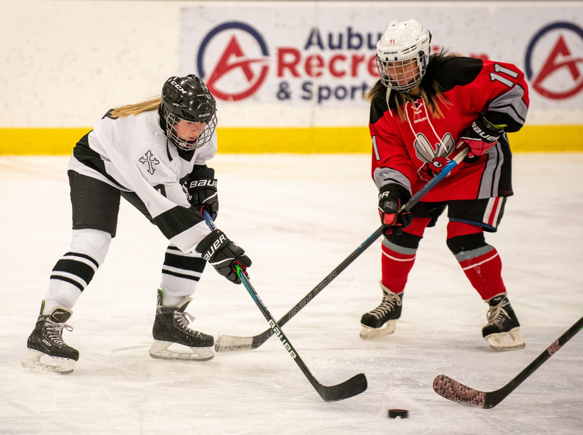 Girls hockey: Saints cruise past Red Hornets
