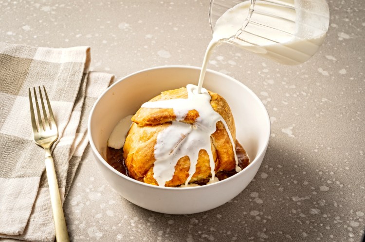 Dutch Apple Dumplings, with heavy cream. MUST CREDIT: Photo for The Washington Post by Scott Suchman.