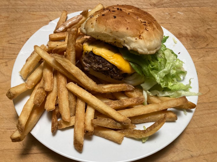 The A&C Cheeseburger with fries, from A&C Soda Shop in South Portland. 
