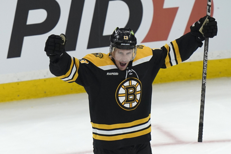 Bruins beat Penguins in overtime for sixth straight win