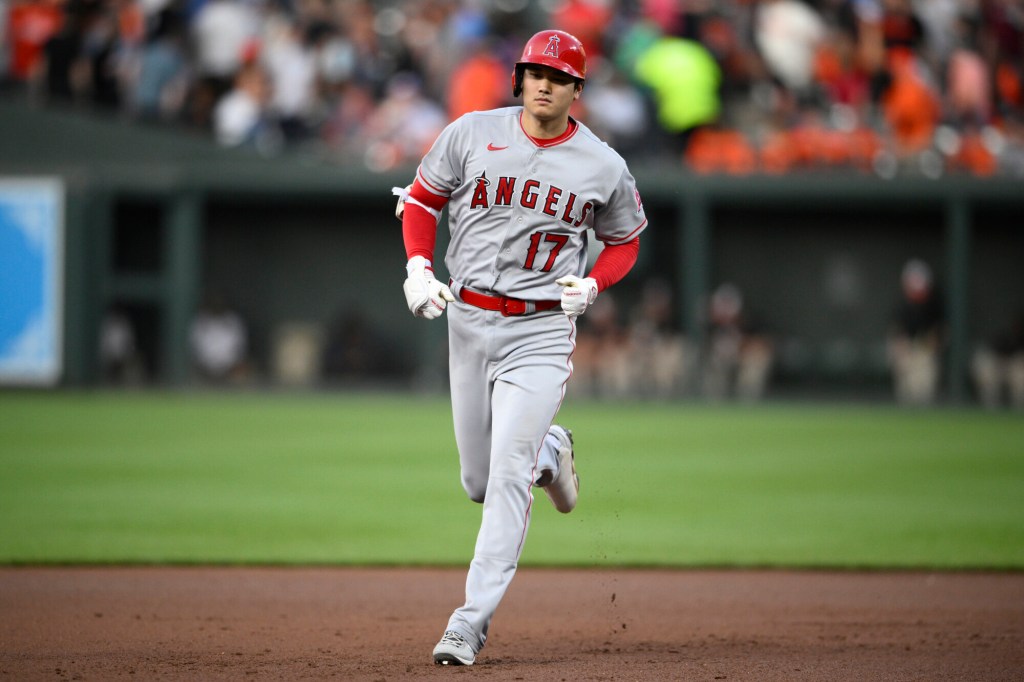 Ohtani gets win, ties for MLB home run lead as Angels beat Rangers