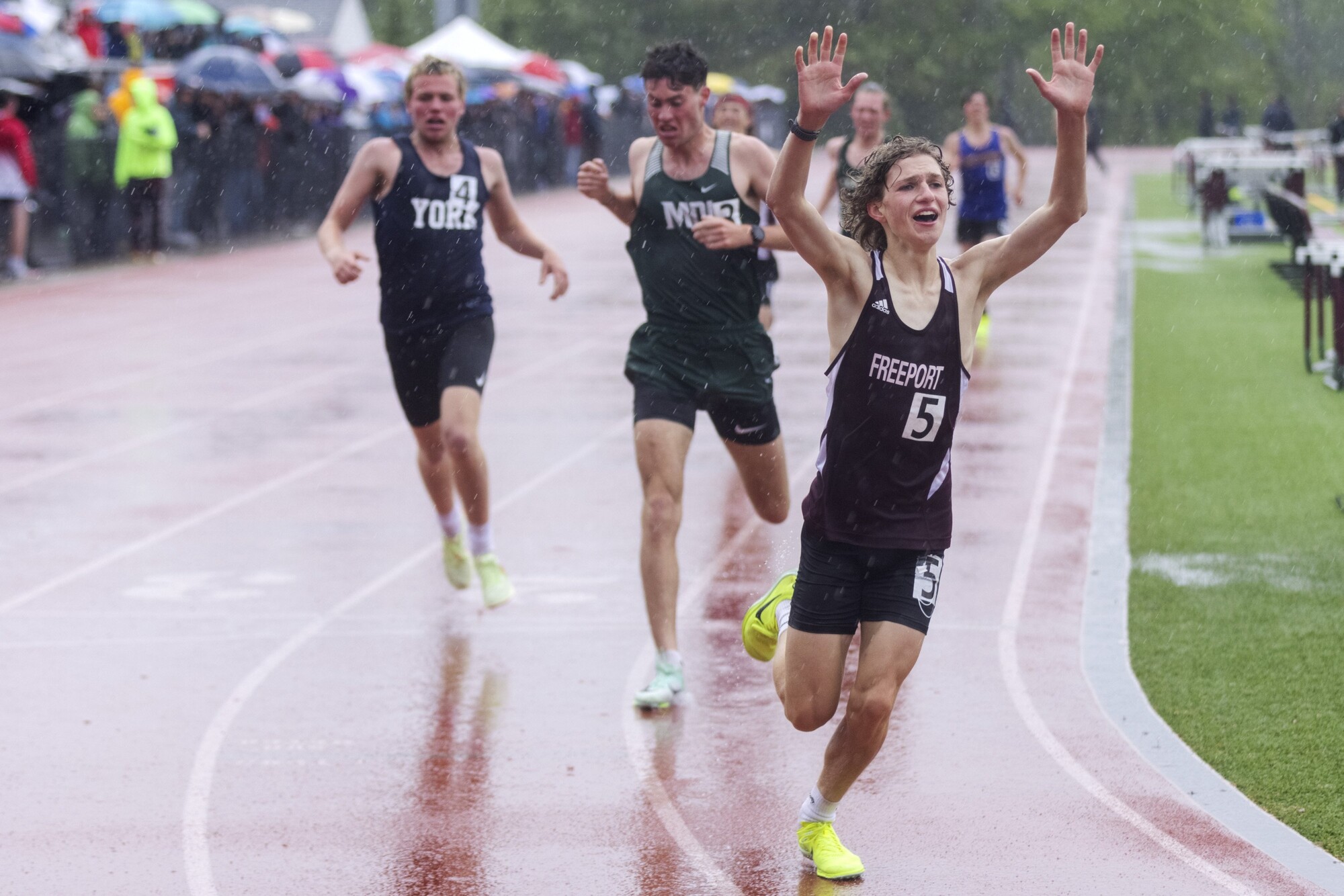 In Photos: Athletes Pour It Out At Rainy Track And Field Championships