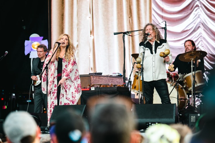 Drummer Jay Bellerose, right, on stage with Alison Krauss and Robert Plant at the Bonnaroo Music & Arts Festival in Tennessee in 2022. 