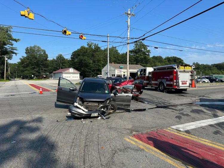 Three people were injured and two had to be extricated after two vehicles collided Monday in Cumberland.