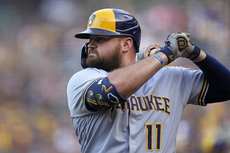 MILWAUKEE, WI - JUNE 17: Milwaukee Brewers first baseman Rowdy Tellez (11)  looks on while waiting to bat during an MLB game against the Pittsburgh  Pirates on June 17, 2023 at American