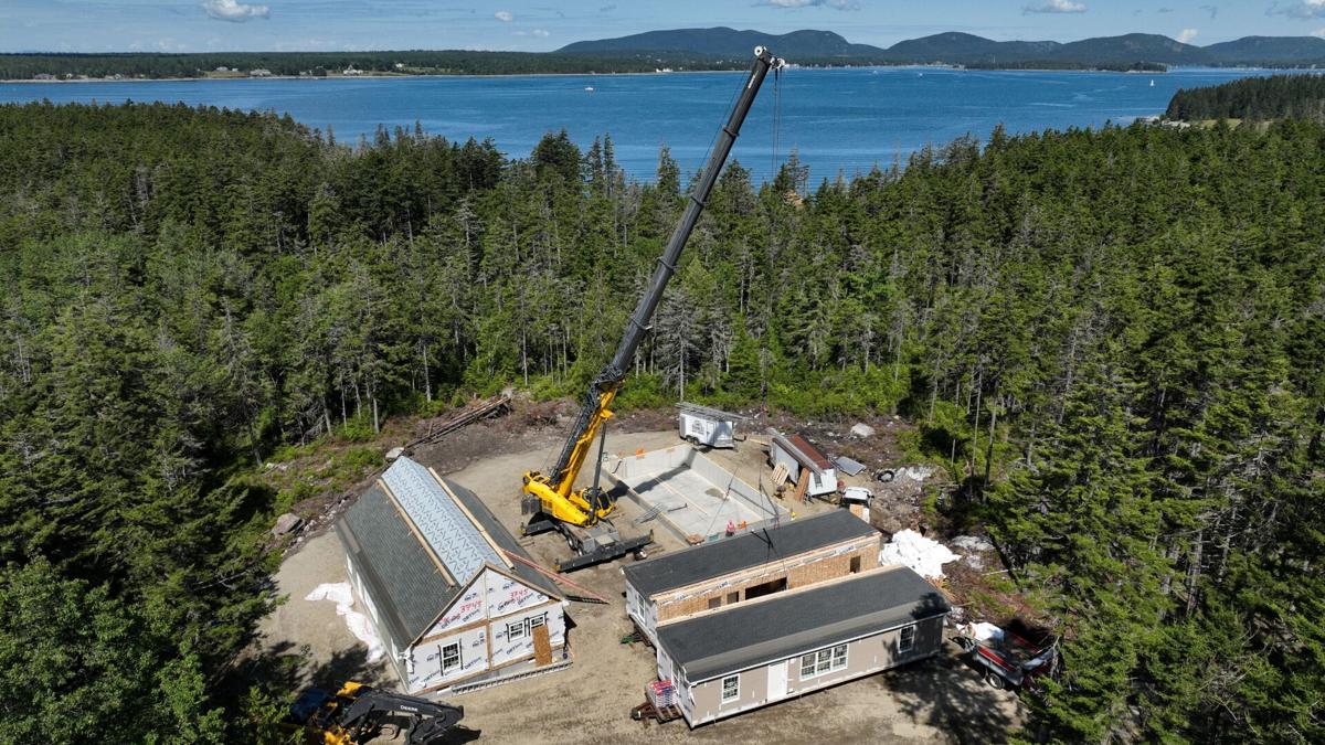 Workforce rental houses built in Paris barged to Great Cranberry Island - Vimarsana News