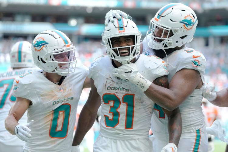 Miami Dolphins Dominate Denver Broncos with 70-20 Victory - Sports