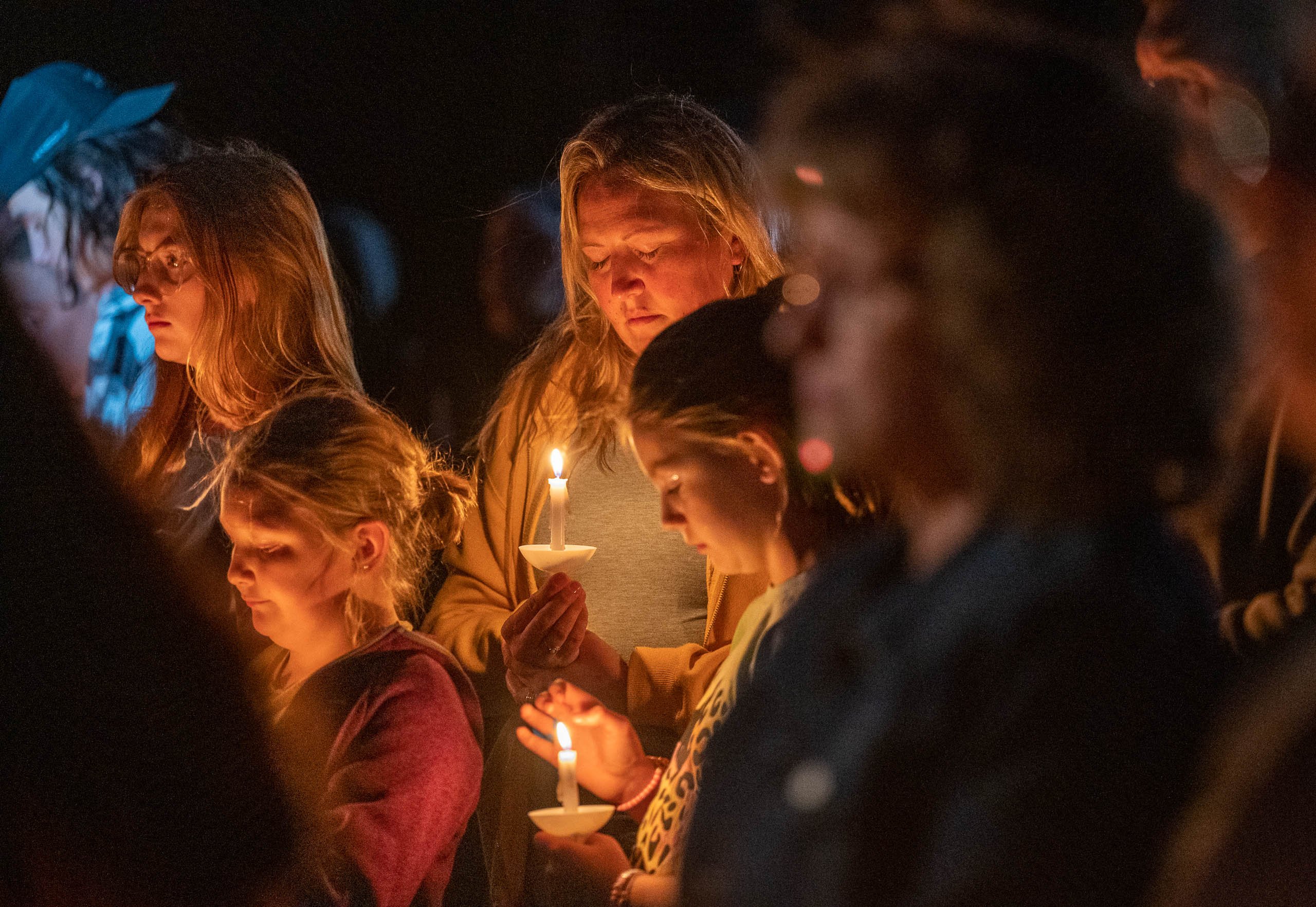 At candlelight vigil in Lisbon, community mourns those lost in attacks - Vimarsana News