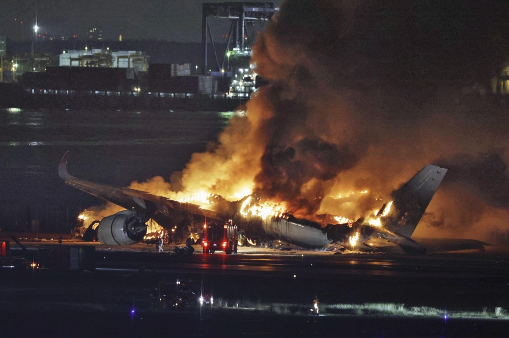 APTOPIX Japan Plane Fire