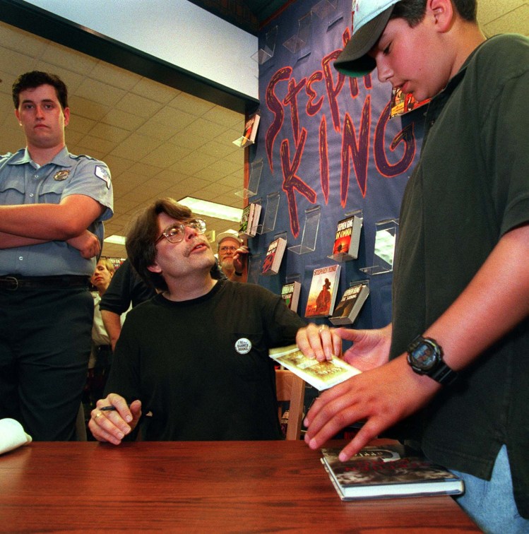 Stephen King signing books at Bookland in South Portland in 1996, around the same time Ray Routhier started covering him. 