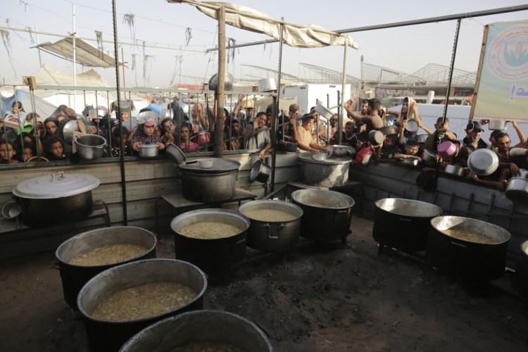 CORRECTION Israel Palestinians Eid Al-Adha