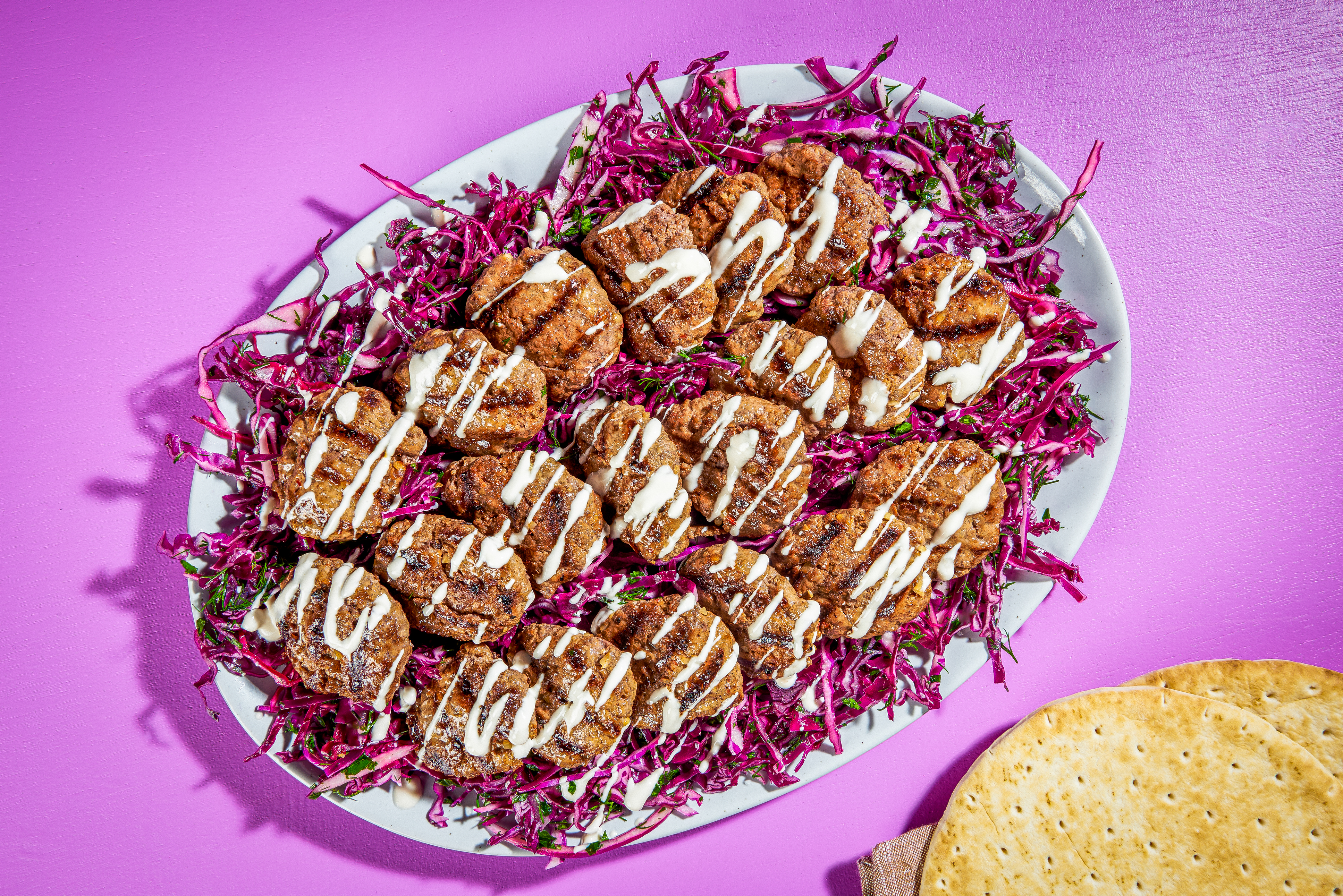 These boldly spiced merguez patties will raise your grilling game