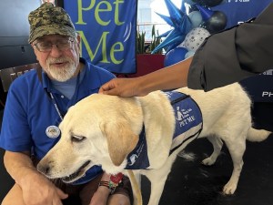 CORRECTION Airport Therapy Dogs