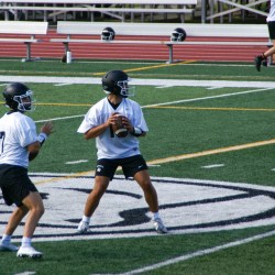 Senior Robbie Long, left, and sophomore Michael Wolfendale compete for the starting quarterback position on Thursday, Aug. 22, 2024.