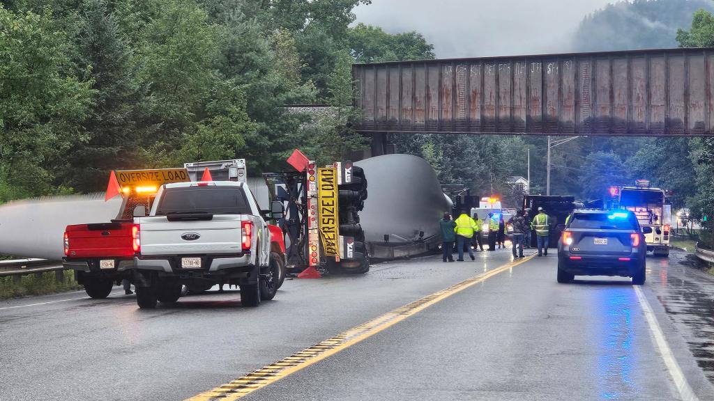 Truck carrying huge wind turbine blade crashes into bridge, overturns and closes Route 1 in Stockton Springs