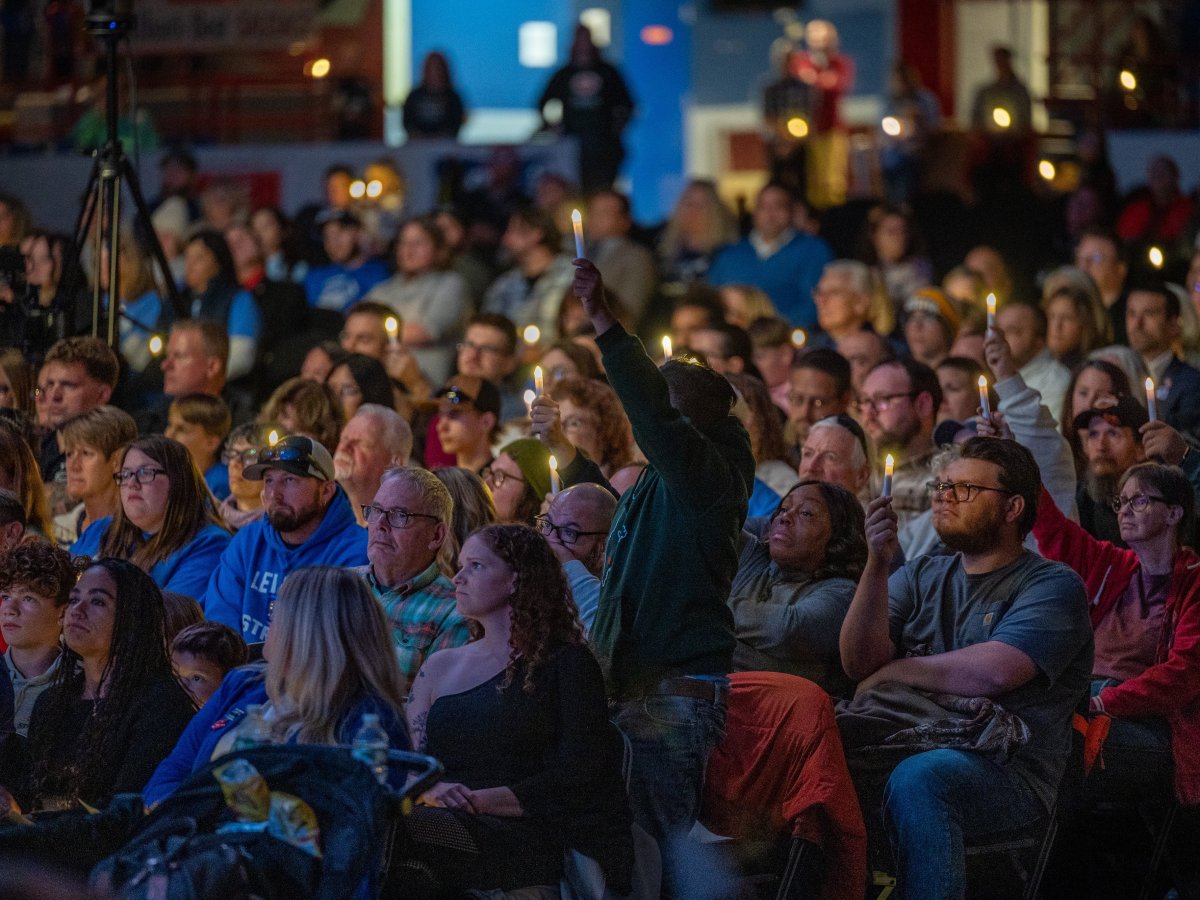 Watch: Lewiston gathering seeks light a year after the darkness