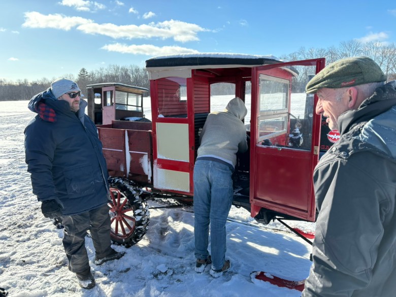 Model T snowmobiling gathering photo
